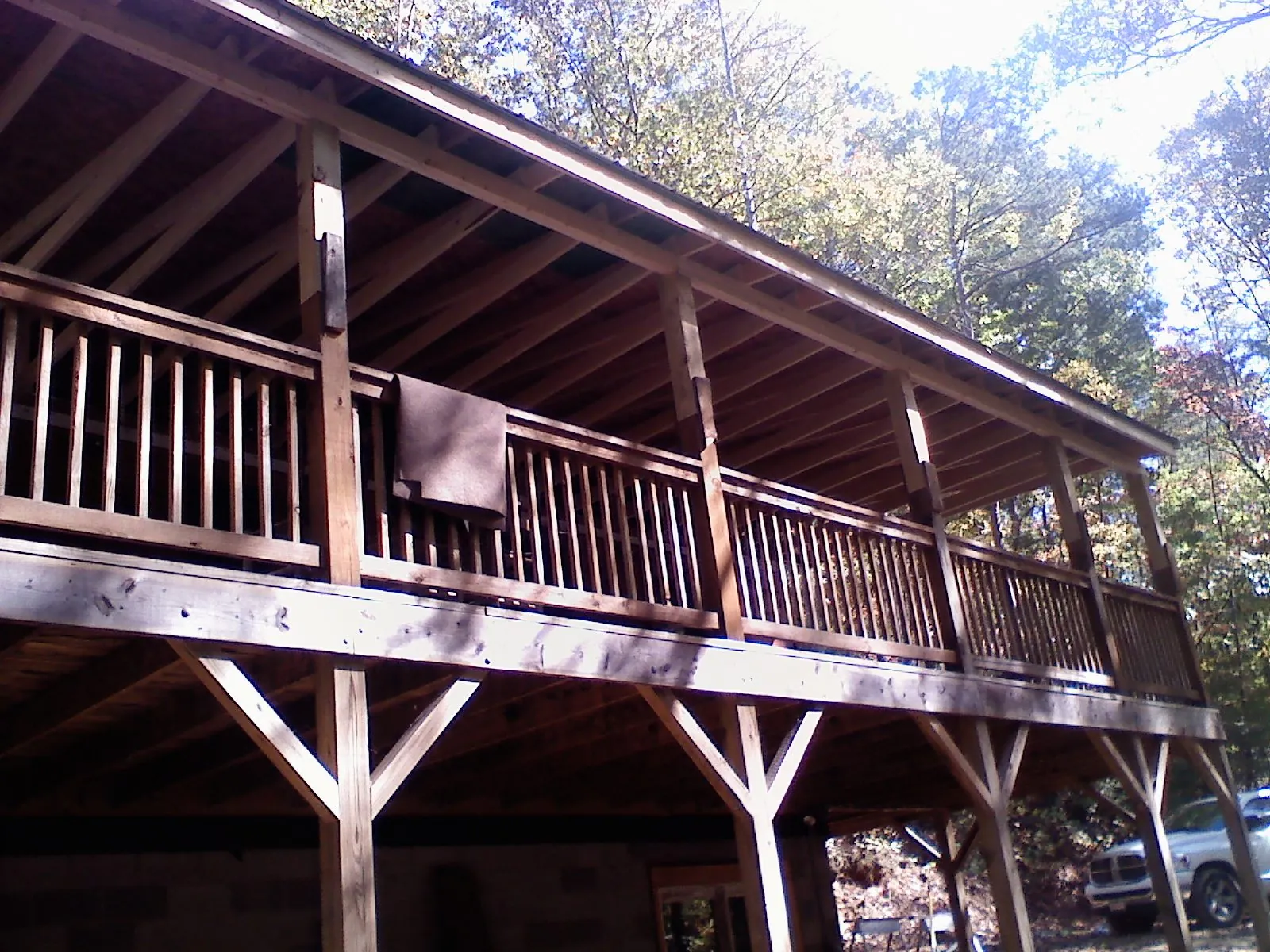 Timber framing under a new elevated porch and deck in Snow Hill